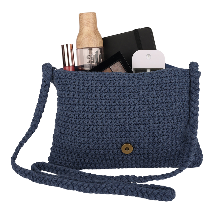The Roxy Chips And Guac Medium Crossbody Bag features a button closure and comes in blue, easily carrying your everyday essentials like a notebook, makeup products, phone, and spray bottle—perfect for staying hands-free while you’re on the move.