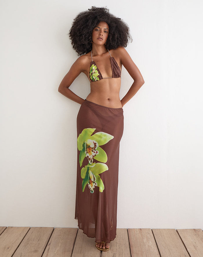 Image of Dartina Maxi Slip Skirt in Brown with Green Dendrobium Flower