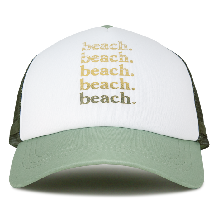The Roxy Dig This Trucker Hat in Oil Green Beach features a green and white design with “beach.” printed four times in gold on the front, offering a lightweight style that’s perfect for embracing a carefree surf lifestyle.