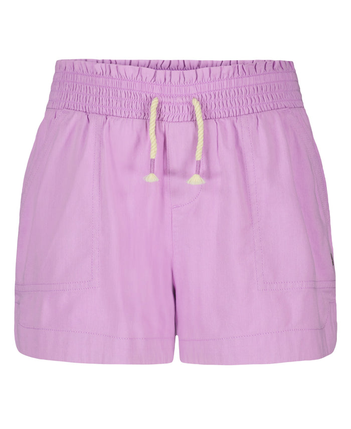 The Roxy Girls' Soleil Short features light purple brushed twill, a smocked elastic waistband with cream drawstring, and two front pockets, shown against a white background.