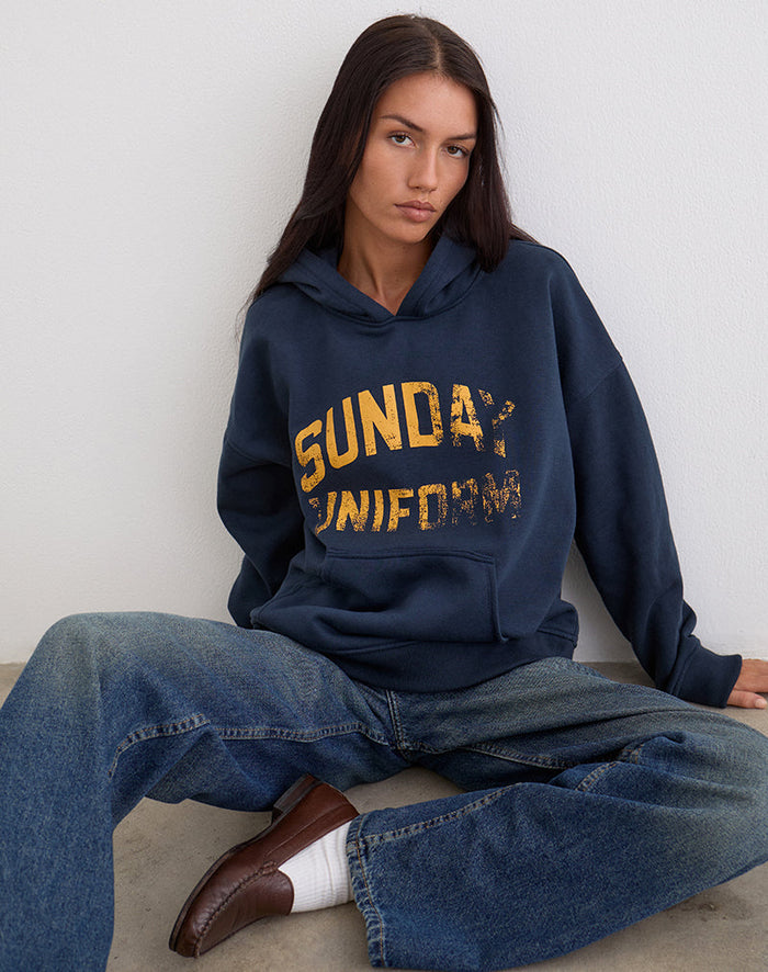 Image of Guyton Hoodie in Navy with Sunday Uniform Graphic