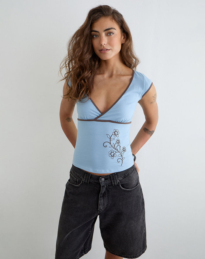 Image of Liuvia Top in Nantucket Blue with Coffee Quartz Binding and Flower Embroidery