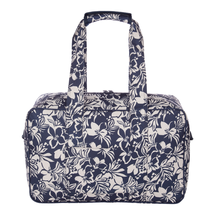 The Roxy Off Shore Duffel Bag features a rectangular shape, two sturdy handles, and a stylish navy blue and white floral pattern. Displayed against a plain white background, this versatile duffel is perfect for all your adventures.