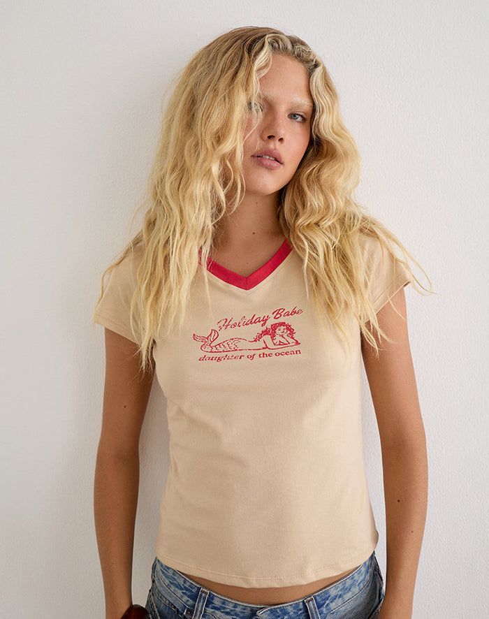 Image of Parman Top in Tan with Red Binding and Mermaid Graphic