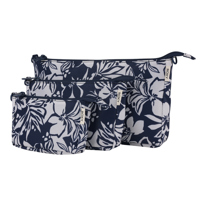 A trio of Roxy Travel Pouch Set organizers in the Oceanside color, featuring zippered closures and varying sizes, are artfully grouped and overlapping against a white background—ideal for stylish packing organization.