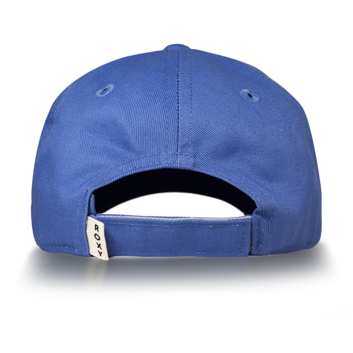 The TW Next Level Baseball Cap by Roxy is shown from the back, highlighting its adjustable strap and a small white tag displaying the Roxy logo. Set against a simple light background, this blue cap is the ideal casual accessory to add a modern touch to any outfit.