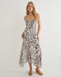 Image of Vakare Midi Dress in Dalmatian Skin Black and Ivory