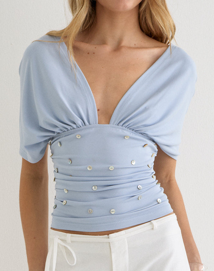 Image of Vernia Plunge Batwing Top in Lyocell Dusty Blue with Pearl Buttons